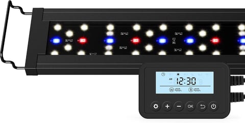 LED aquarium light fixture with programmable controller displaying time 12:38 and multiple colored LED modules
